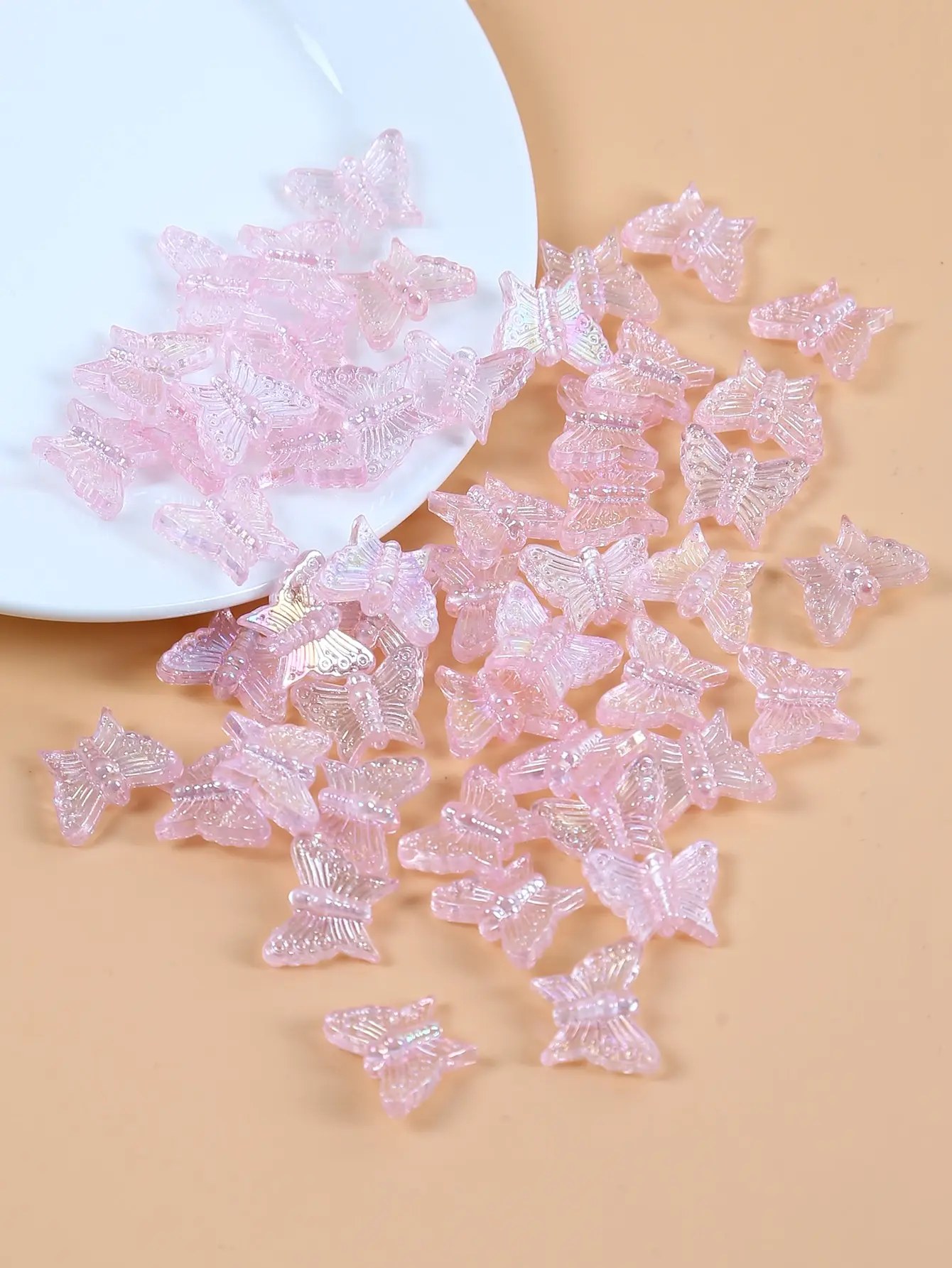 50 pink butterfly beads for handcrafting