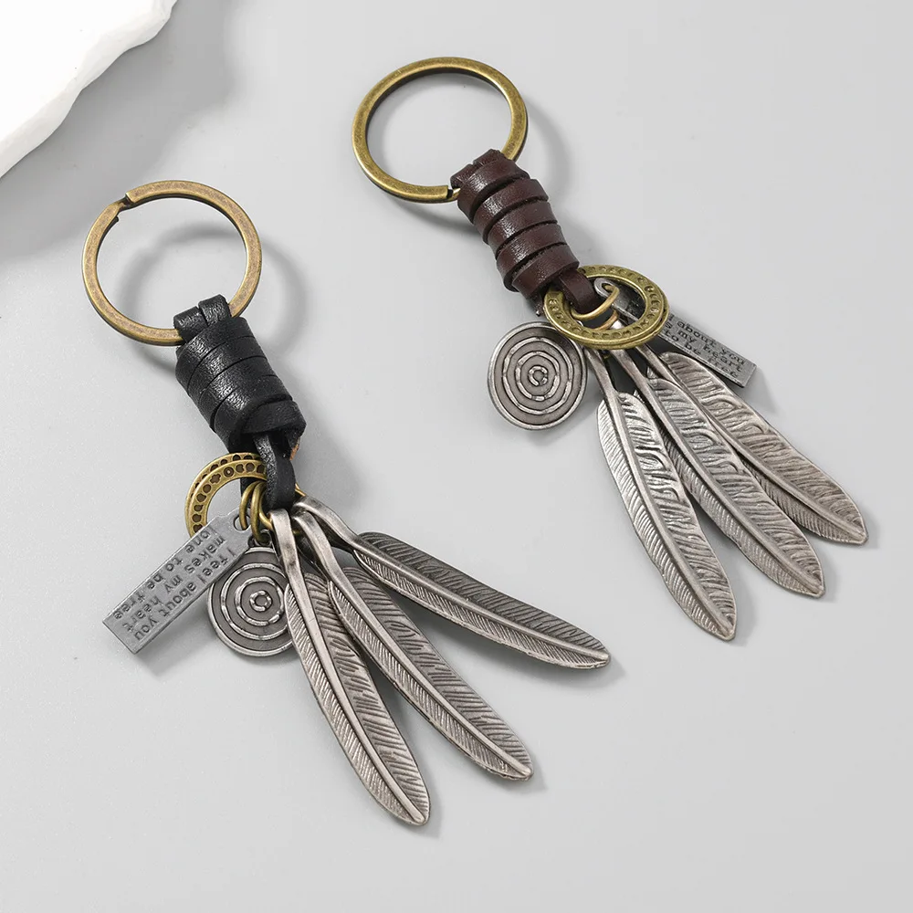 New style creative feather keychain, vintage handmade cowhide rope keychain. Keychain pendant, accessory for both men and women.