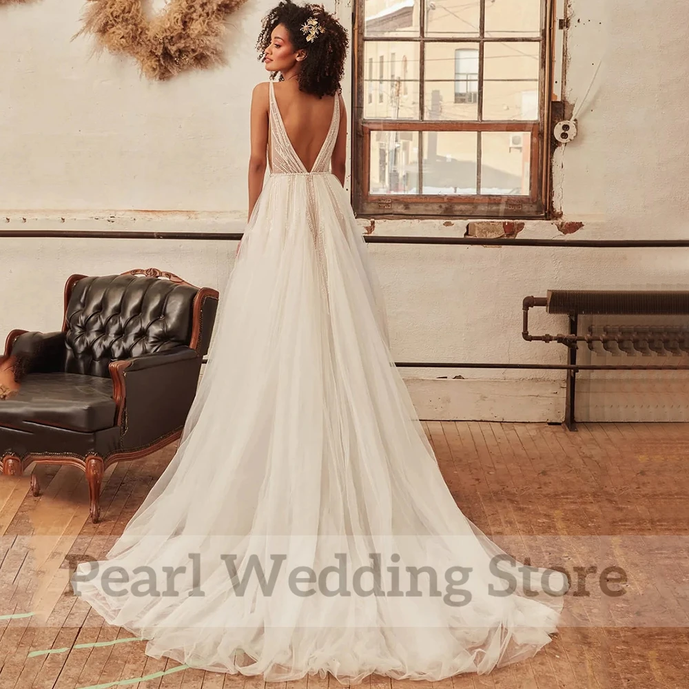 Charming Beading Wedding Dresses Deep V-Neck Sleeveless A-Line Tulle Open Back Bridal Floor Length with Sweep Train Gowns