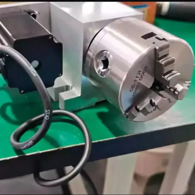 CNC indexing head A-axis Rotary shaft Hollow shaft Through hole diameter 30MM Three-jaw chuck