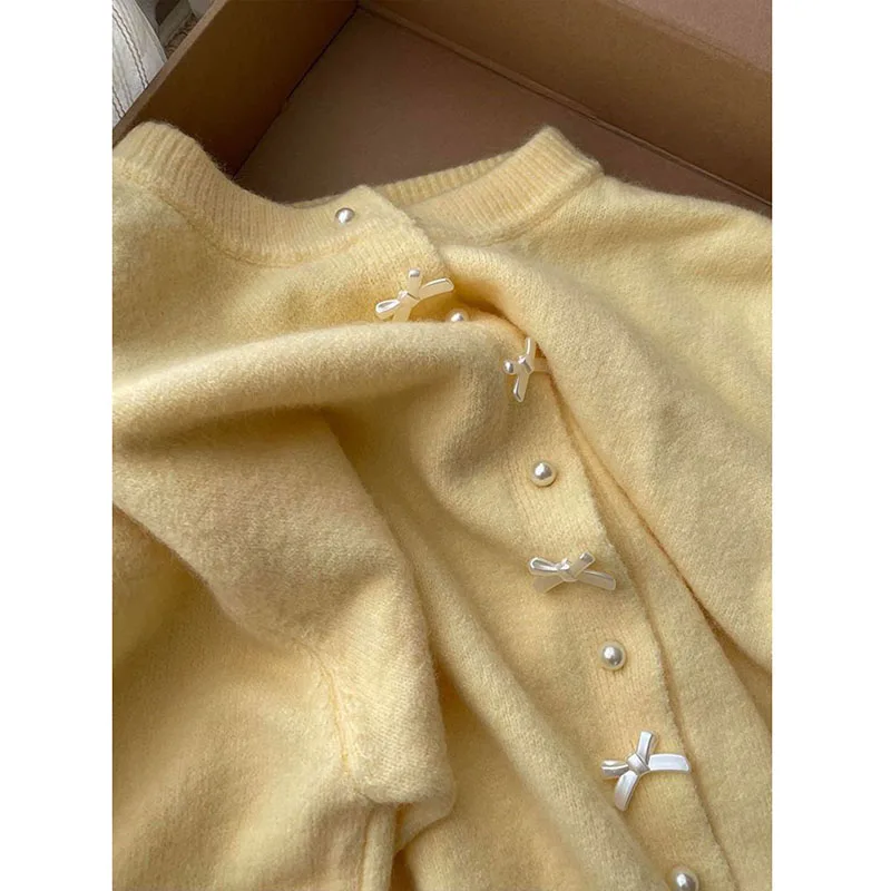 Cardigan lavorato a maglia con fiocco carino dolce giallo decorato da donna cardigan a maniche lunghe a maniche lunghe con colletto tondo allentato casual