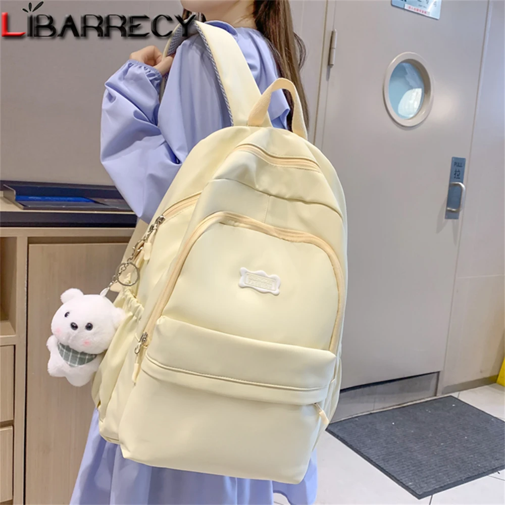 Mochila De nailon De gran capacidad y alta calidad para Mujer, nuevo bolso De estudiante De Color sólido, mochila para ordenador portátil a la moda para Mujer, Bolsos De Mujer