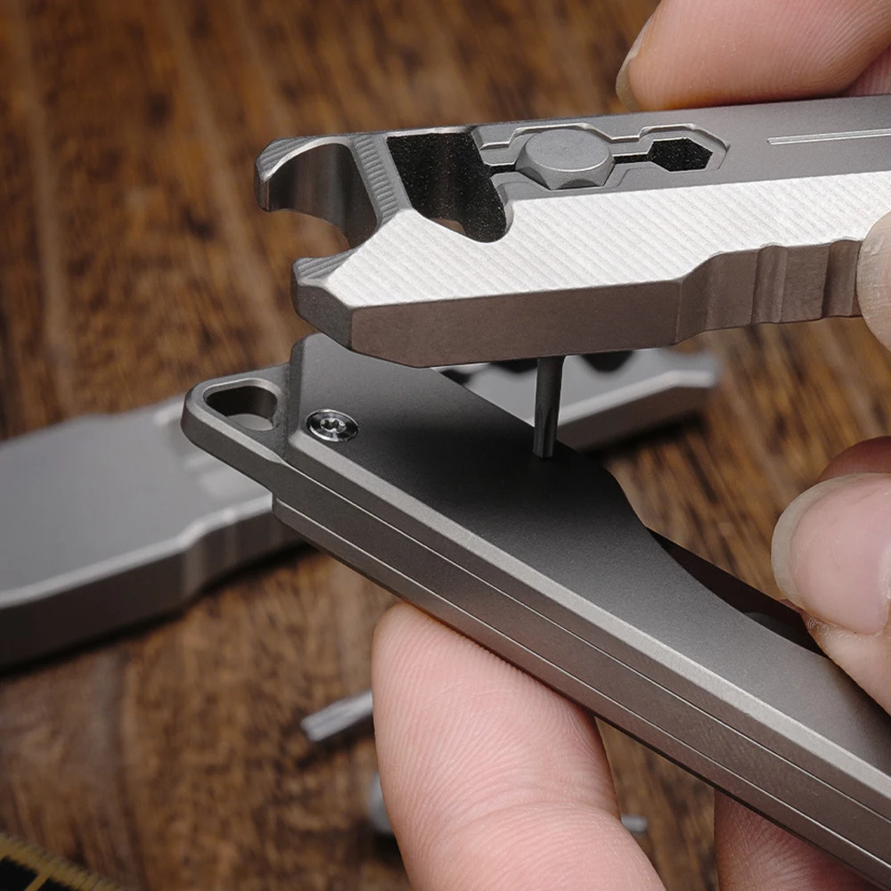 

Многофункциональный инструмент из титанового сплава TC4: рычаг для вскрытия, отвертка с трещоткой, открывалка для бутылок, портативный EDC-инструмент для кемпинга, A1593