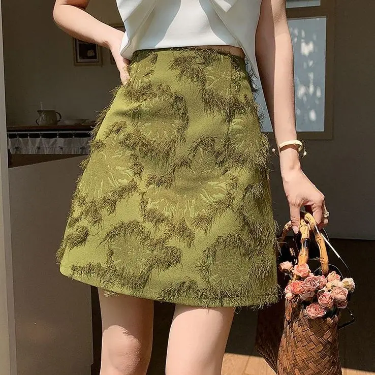 

New Chinese buckle half skirt for spring and summer, 2024 design split three-dimensional jacquard tassel A-line short skirt