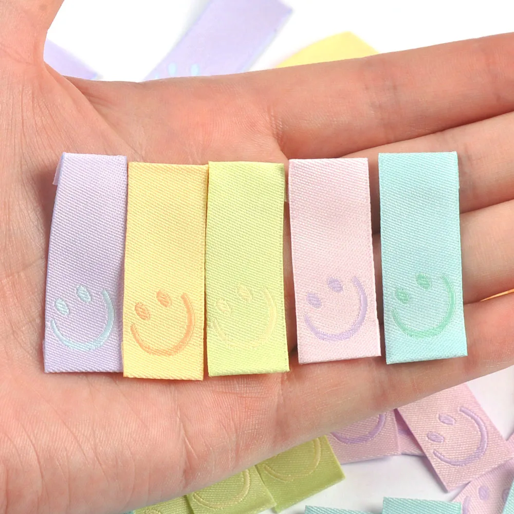 50Pcs New Candy Color Embroidery Smile Labels For Sewing Accessories Clothes Washable Care Garment Bags Tags DIY Supplies c3513