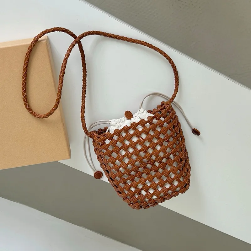 

Quality Cowhide Hand-woven Bag Fashion Hollow Out Design Women's Weave Drawstring Bucket Bag 2025New Seaside Beach Crossbody Bag