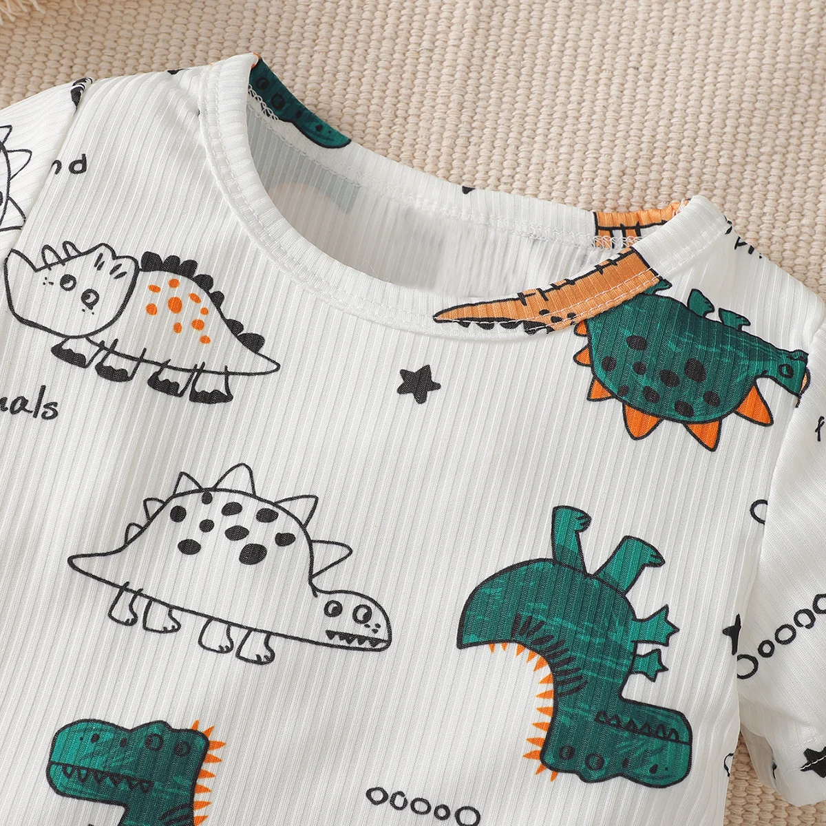 Boys and girls summer short-sleeved dinosaur letter pattern pit stripe material T-shirt and shorts set