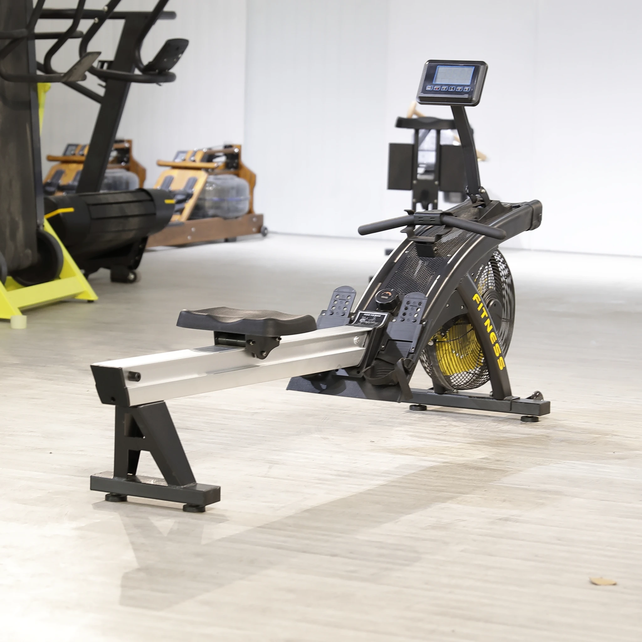 Venta directa de fábrica, equipo de gimnasio para entrenamiento, remo de resistencia al viento, máquina de remo comercial, remo de aire para Club de gimnasio