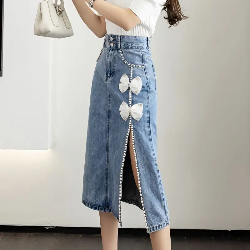 

2024 Summer Women's Casual Fashion Elegant Commuting Heavy Industry Western Style Bow Cowboy Half body Split Bag Hip Skirt