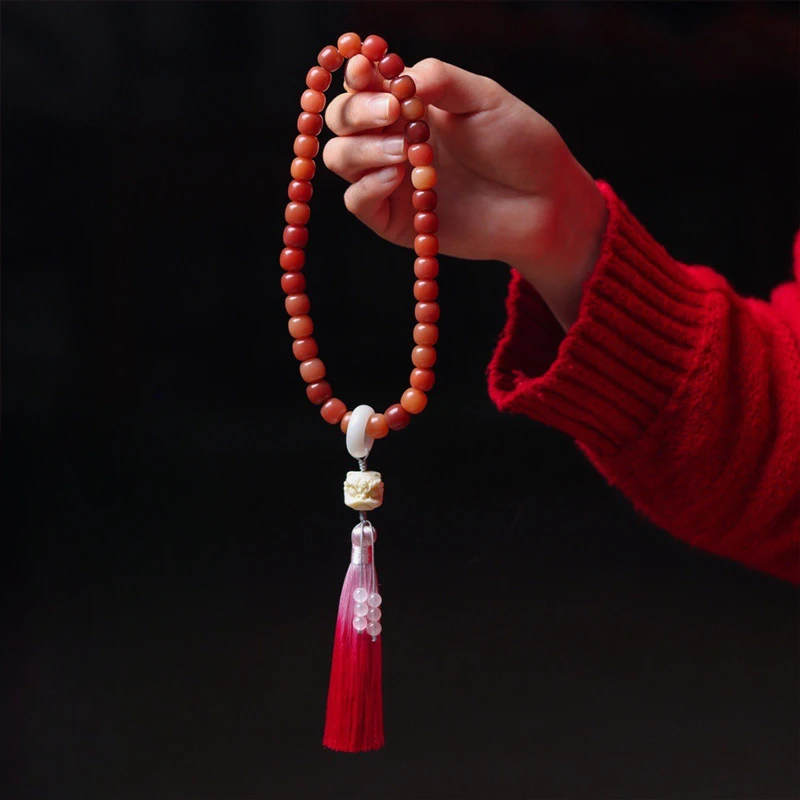 

Chinese style white jade bodhi root hand-held bracelet with tassels and tassels running ring bracelet