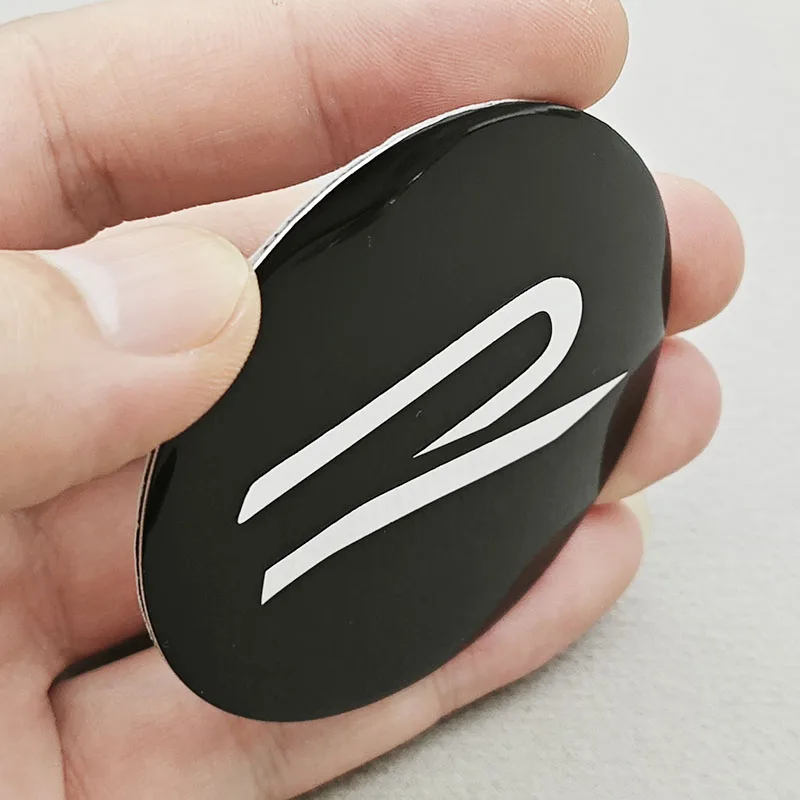 4 قطعة غطاء مركز عجلة السيارة محور قبعات شعار R شارة ملصق ل Volkswagen VW جولف ساجيتار باسات بيتل توران أطلس T-Roc