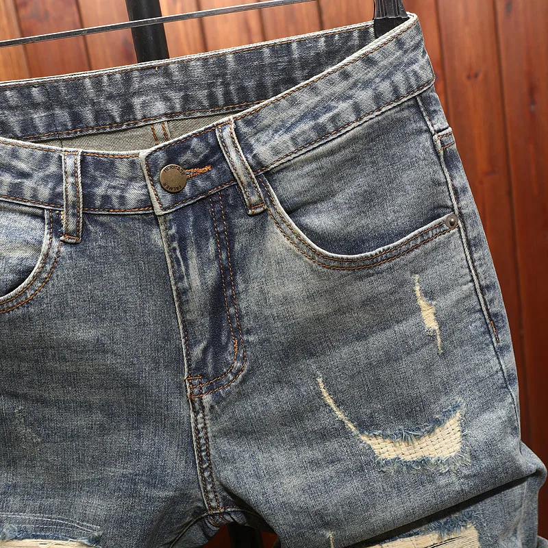 2025 men's clothing, cool and retro, with ripped patches and scraped denim shorts, men's trendy and fashionable cropped pants