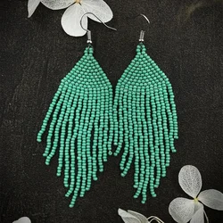 Fringed earrings Hand woven fish tail Versatile Beading Simplicity Bohemia geometry alloy ma'am Rice bead earrings