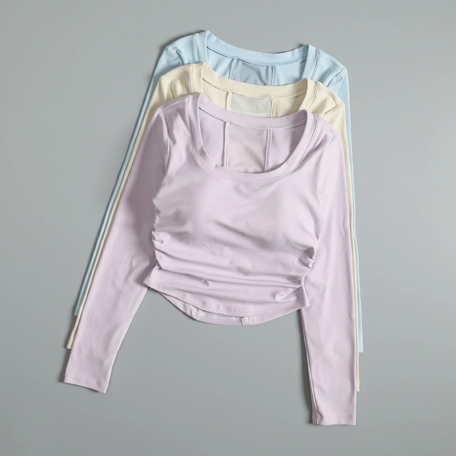 Odzież do jogi dla kobiet 2025 nowy styl z wkładkami na biust długi rękaw jesień i zima trening Pilates topy sportowe do biegania
