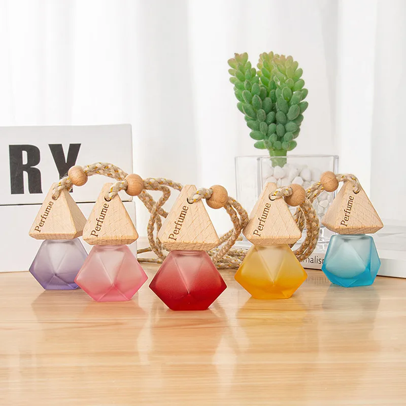 

Wholesale 8ML Empty Car Air Freshener Pendant Perfume Glass Bottle With Wooden Caps Refillable Car Essential Oil Diffuser Bottle