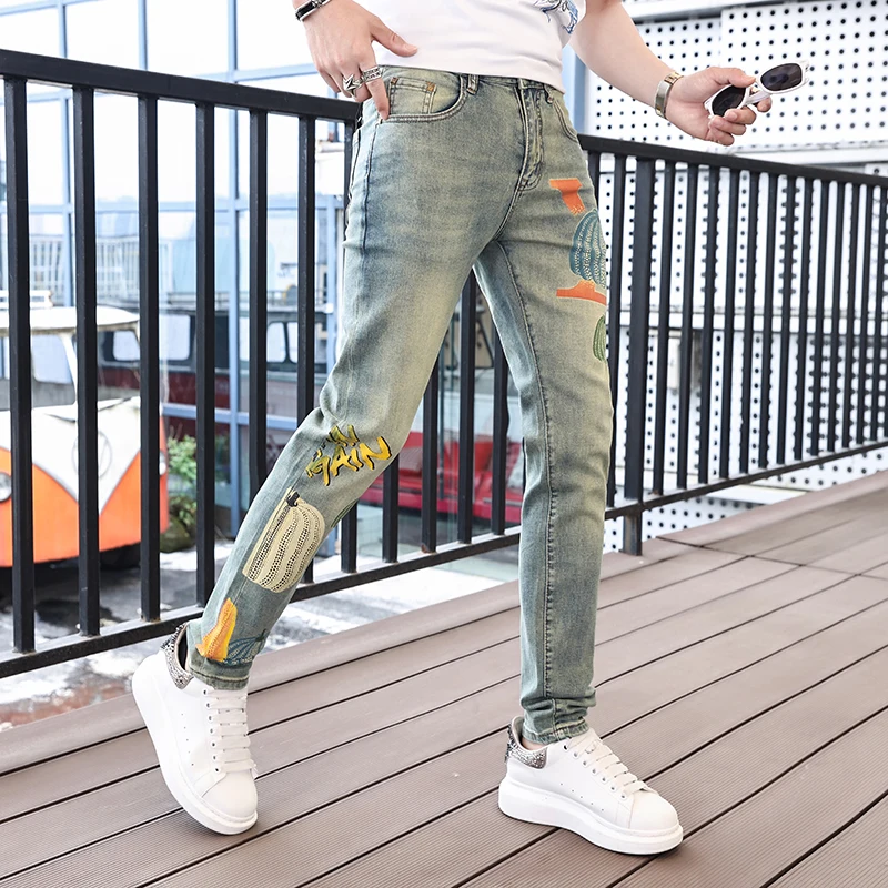 

INS Net Red Pumpkin Printed Jeans for Men 2024 Spring and Summer Trends Casual Fashion Personality Street Slim Fit Tapered Pants