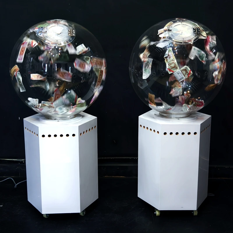 Reach money grabber, ball grabber, lottery machine