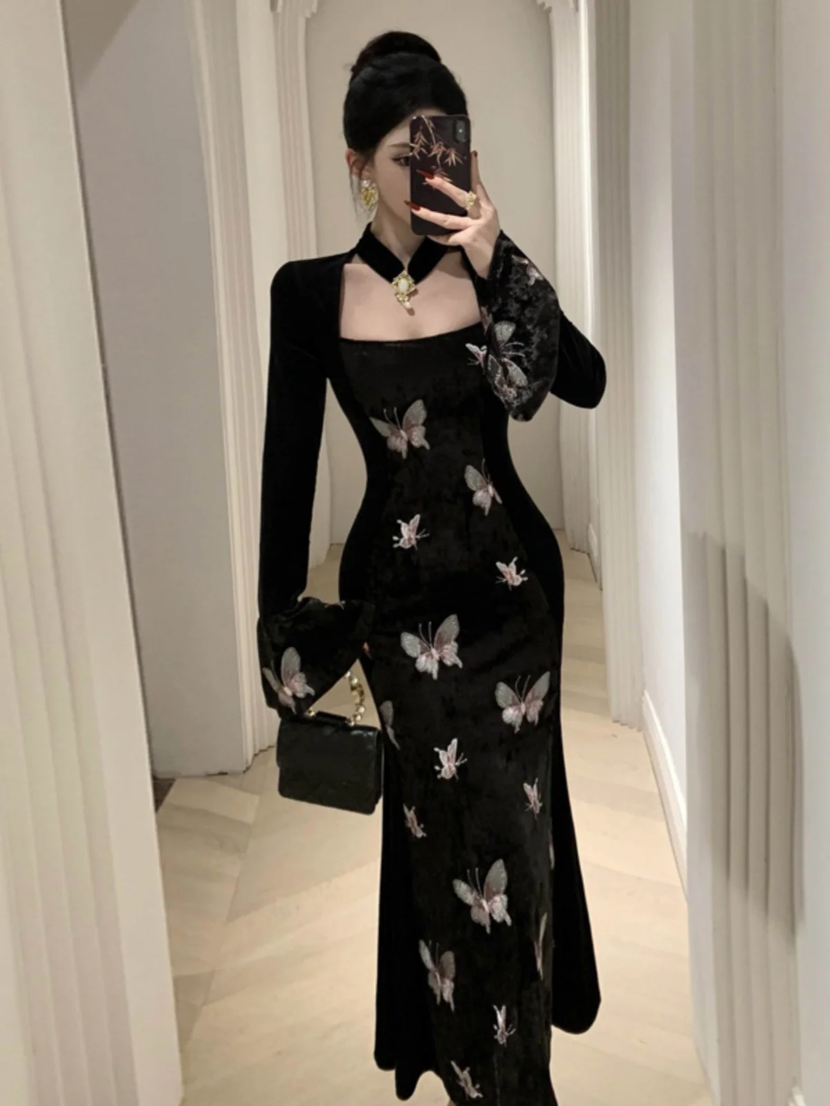 Falda de cola de pez de mariposa con estampado empalmado de terciopelo negro Vintage francés de gama alta para mujer primavera otoño Sexy falda larga ajustada calada