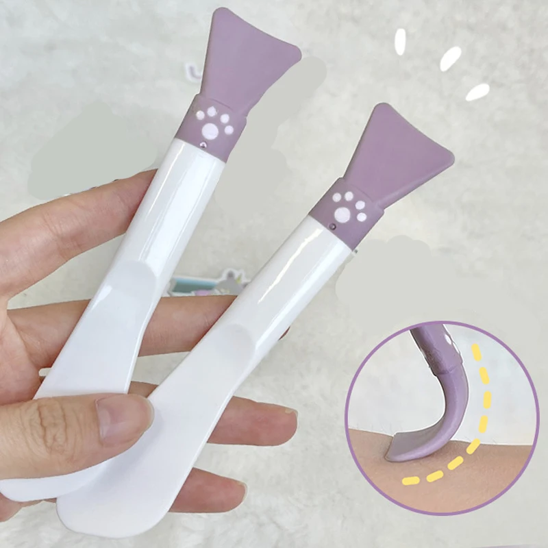 Raspador aplicador de mascarilla Facial de silicona, cepillo facial de pata púrpura, herramientas de cuidado de la piel DIY de belleza de doble cabeza, 1 ud.