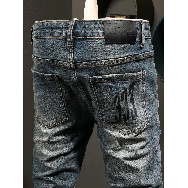 

Retro trendy printed jeans slim fit small feet 2025 new men's clothing street fashion denim long pants