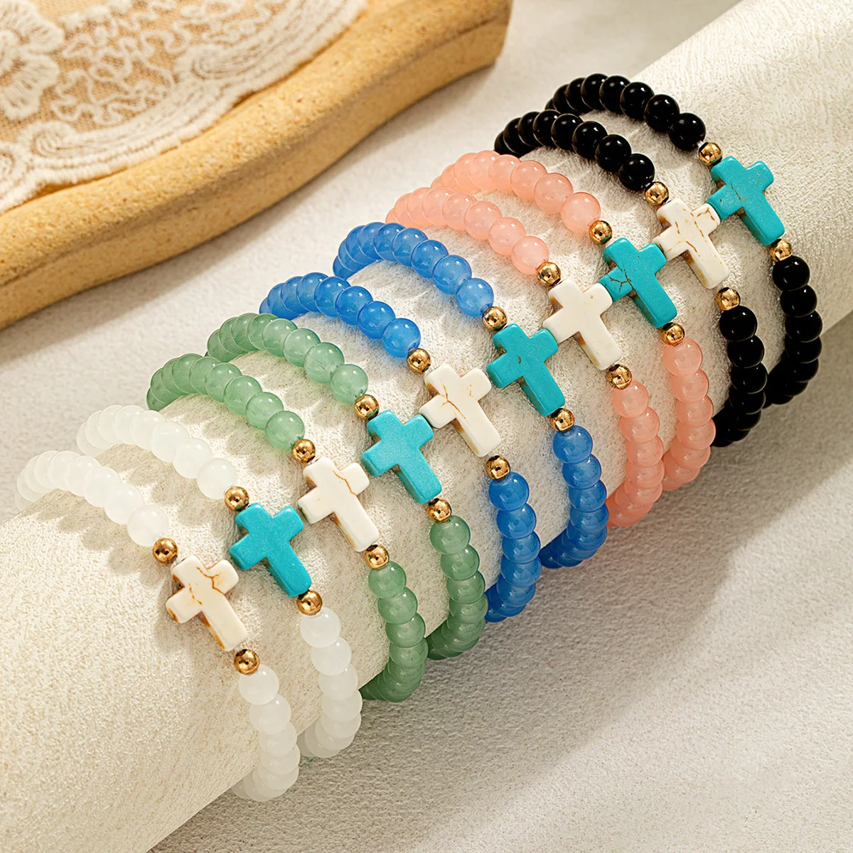 Bohemian style cross colored bead bracelet with multiple pieces of stacked women's bracelet set