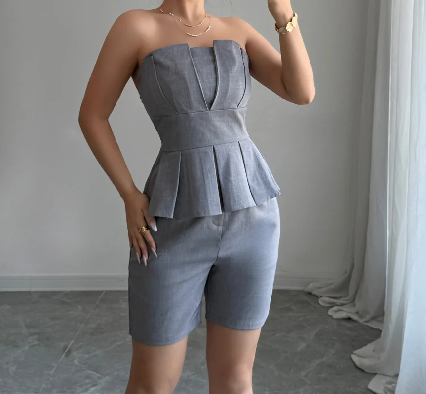 Tweedelige set damesoutfit 2025 zomer nieuwe effen kleur elegante bandeau rits terug ruches tank en hoge taille casual shorts set