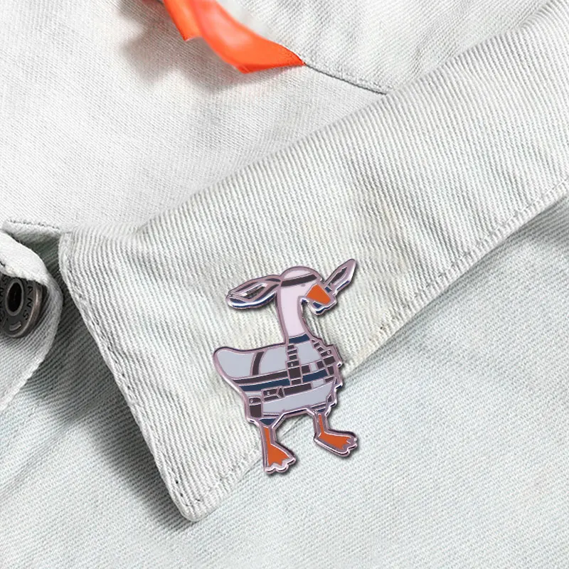 Lovely White Goose Enamel Pin Cartoon Animal Goose Holding A Knife In His Mouth Badge Lapel Backpack Pin Jewelry Gift Wholesale