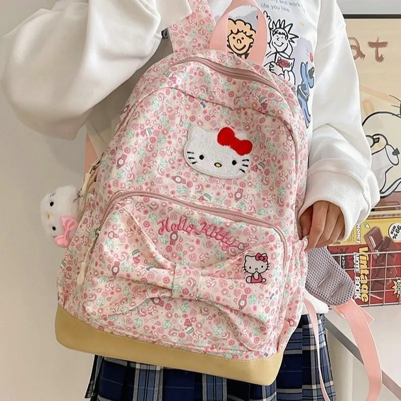 Hello Kitty กระเป๋าเป้เด็กผู้หญิงวัยรุ่นผู้หญิงกระเป๋าเป้สะพายหลังเดินทางกระเป๋าหนังสือโรงเรียนเด็ก mochila Escolar