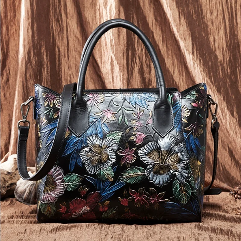 

A Chinese ethnic style women handbag with a floral design, featuring a top layer of genuine cowhide a single-shoulder crossbody