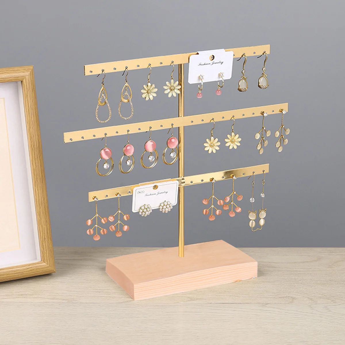 

Iron jewelry rack creative gold 52 hole jewelry rack earring rack necklace jewelry display rack wooden ornaments preferential