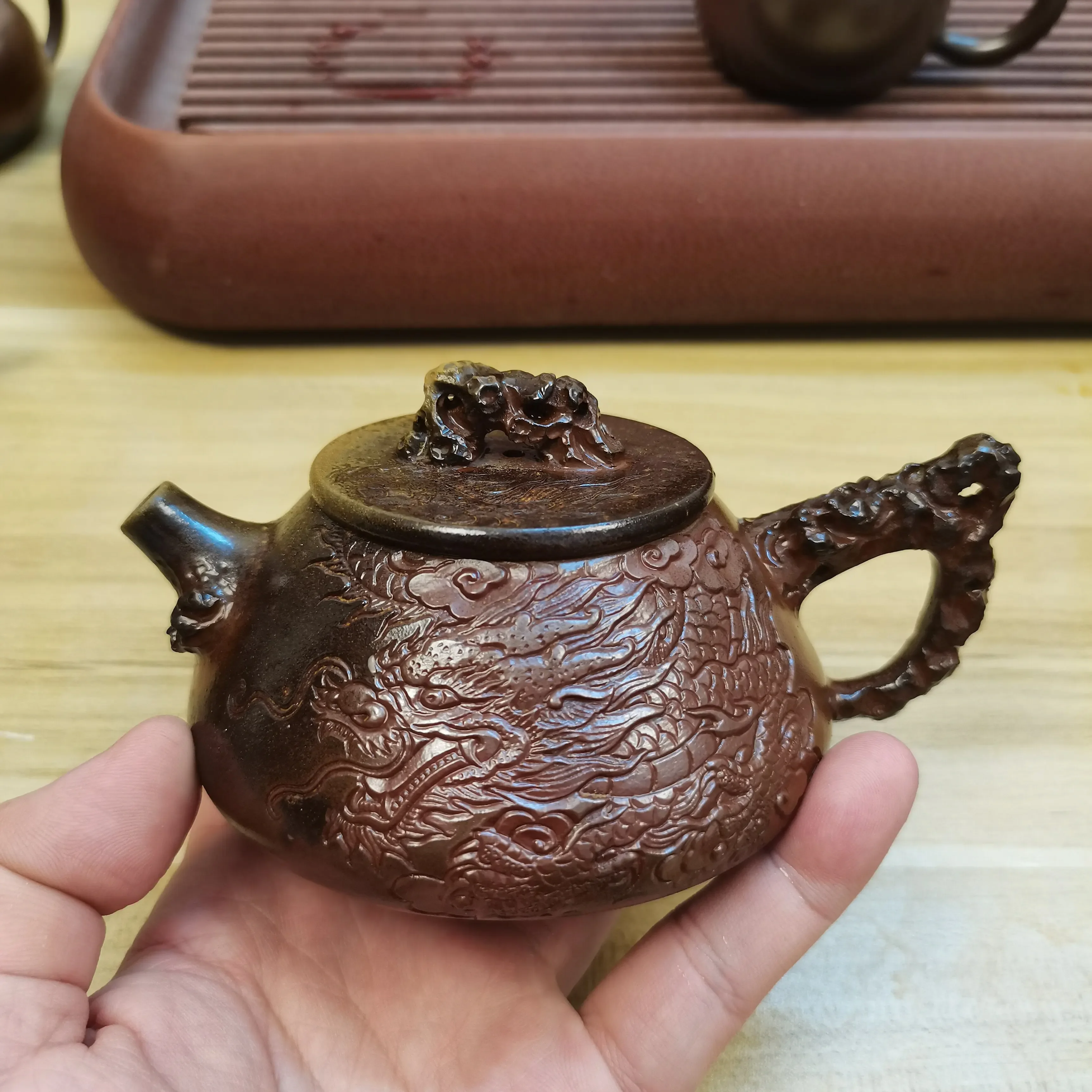 Qinzhou Nixing pottery teapot bionic stone scoop pure hand-carved relief dragon pot large-capacity firewood burning boutique