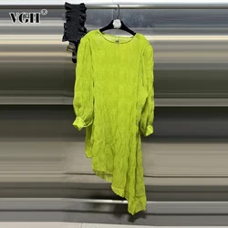 VGH Solid Patchwork Belt Irregular Hem Shirt For Women Round Neck Long Sleeve Spliced Button Minimalist Long Blouse Female New