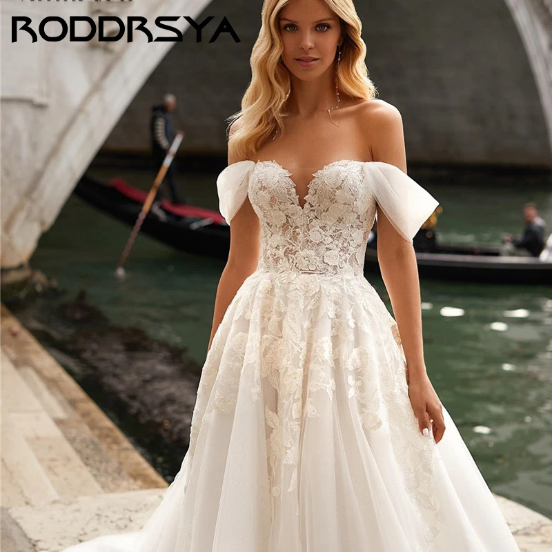 RODDRSYA Romântico Tule Applique A linha Vestido De Noiva Sexy Strapless Fora Do Ombro Noiva Festa Simples Lace Up Back Trouwjurk Romântico Tule Applique A linha Vestido De Noiva Sexy Strapless Fora Do Ombro Noiva Fest