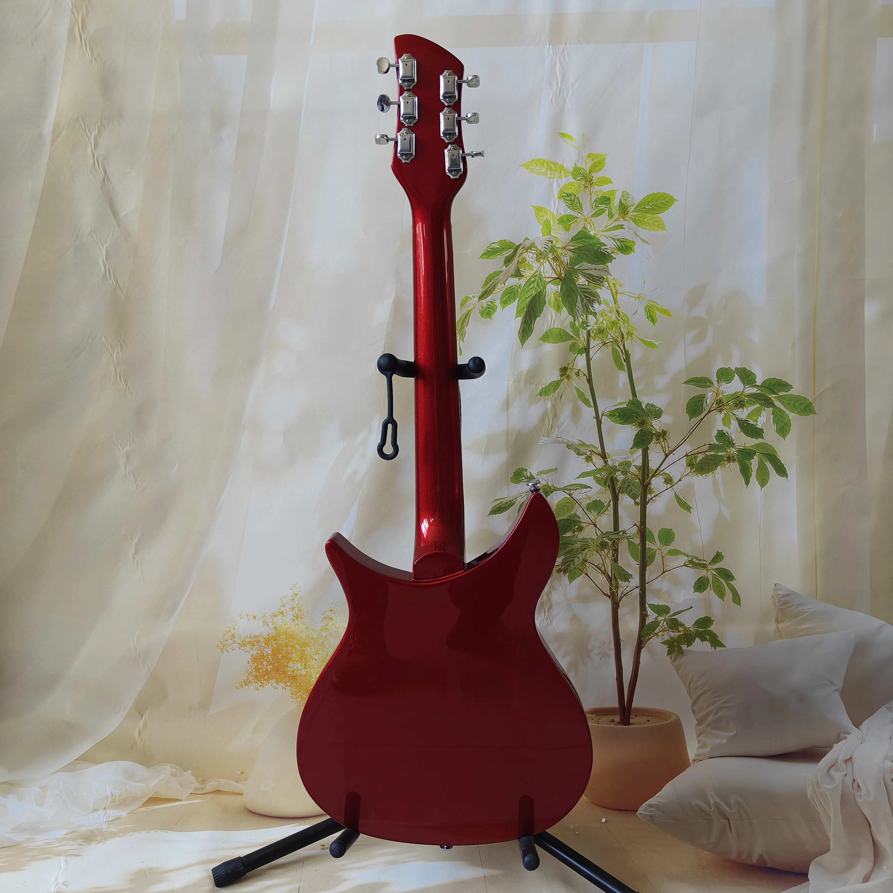 A high-quality acoustic-electric guitar with a solid wood body and stainless steel frets, played right-handed for rock music.