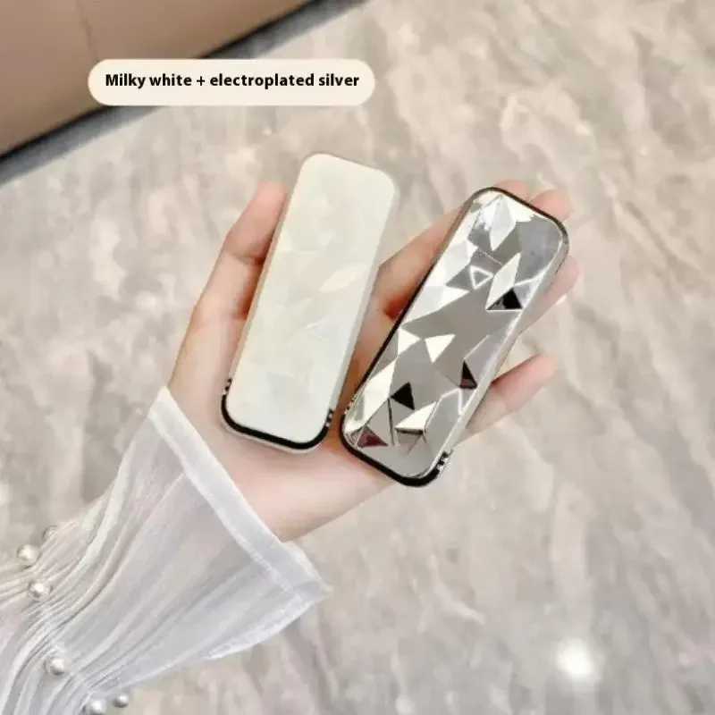 Mini szczotka do włosów 2 w 1, składana szczotka do masażu głowy, antystatyczna, przenośna, z lusterkiem, z poduszką powietrzną do masażu skóry głowy.