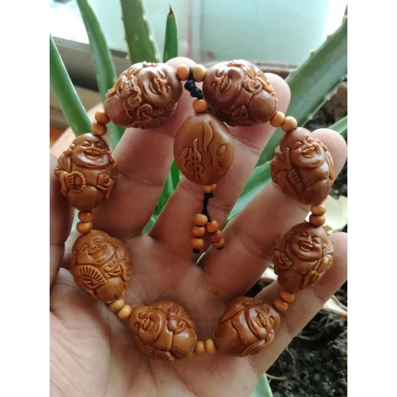 

Nut Maitreya Buddha Short round Iron Core Men's Crafts Olive Hu Carved Bracelet