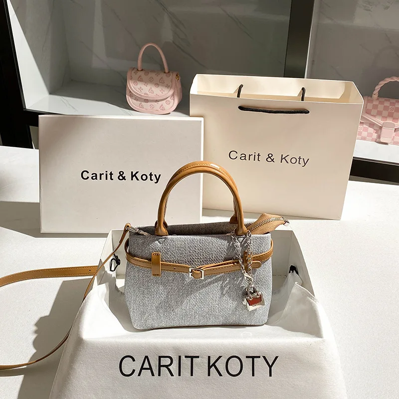 

Fashion niche contrasting platinum bag 2026 new high-end work handbag