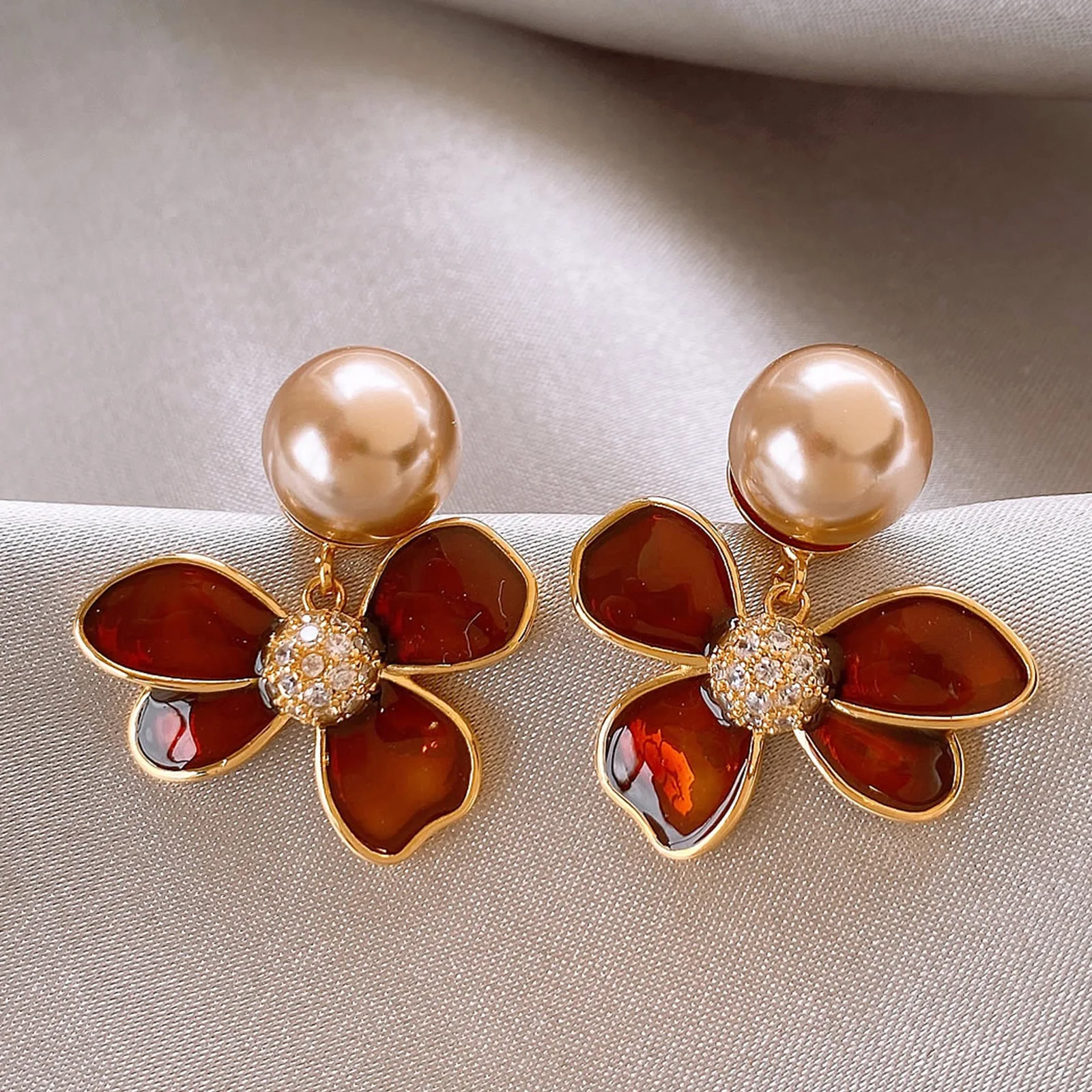 

Elegant Coffee Colored Enamel Flower Petal Pendant Earrings Micro Inlaid Zircon New Design Jewelry Accessories for Women 2026