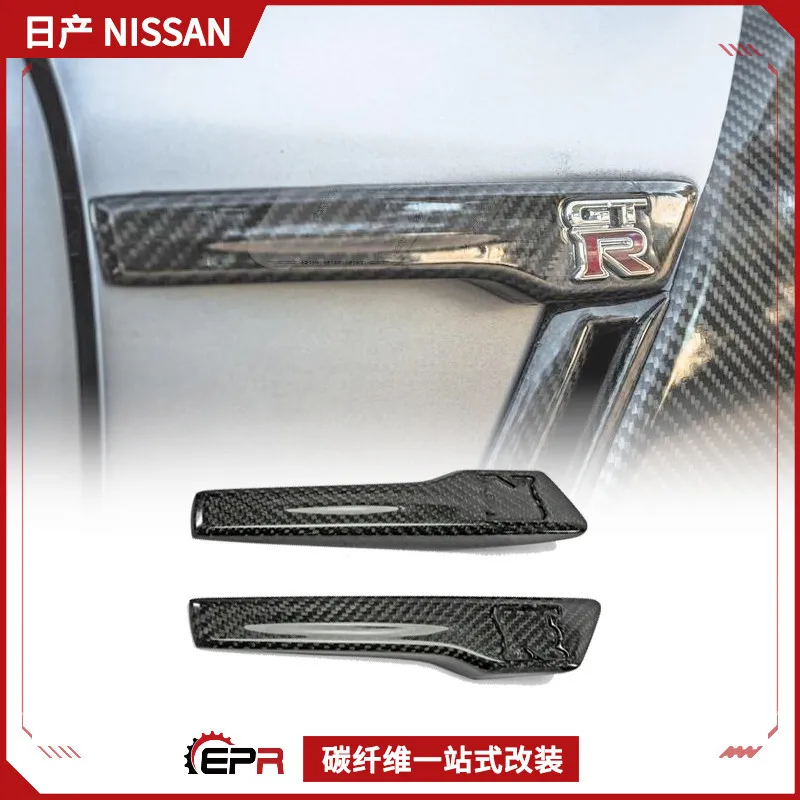 

Suitable for Nissan Ares GTR R35 carbon fiber modification, front fender LOGO logo replacement head sand board car logo