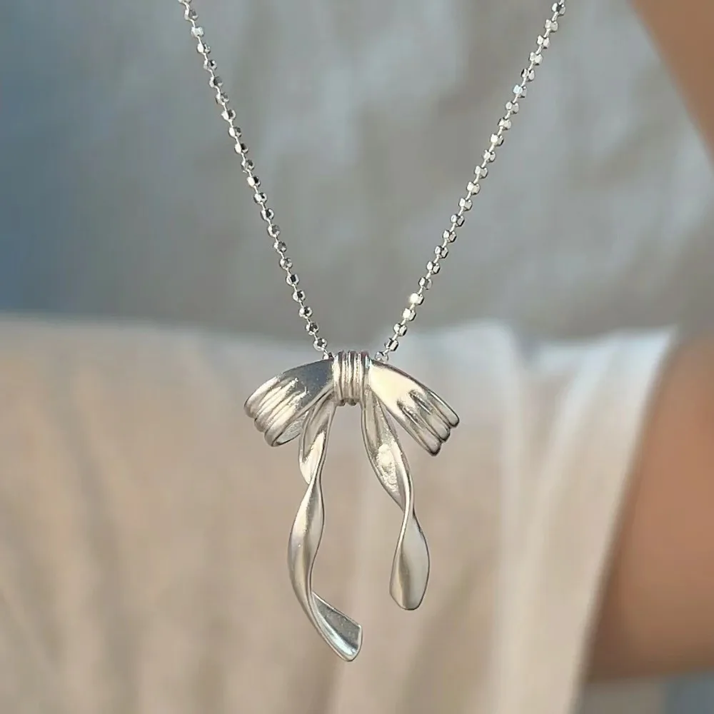 جديد الأرز حبة ضئيلة القوس قلادة الراقية الانحناء بسيط القوس الملحقات خمر سلسلة الترقوة