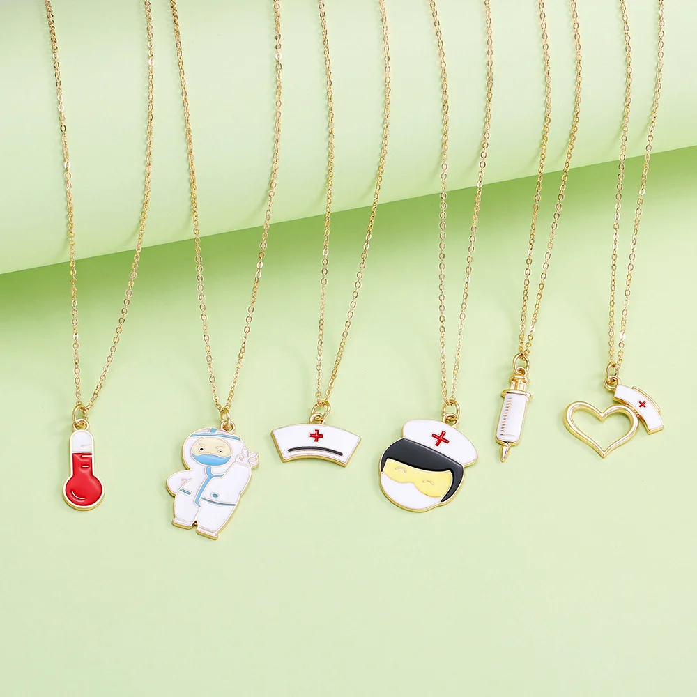 مجوهرات إبداعية لطيفة للرعاية الطبية الأوروبية والأمريكية، قلادة إبرة ممرضة مصنوعة من سبيكة يقطر الزيت، قلادة على شكل عظمة الترقوة