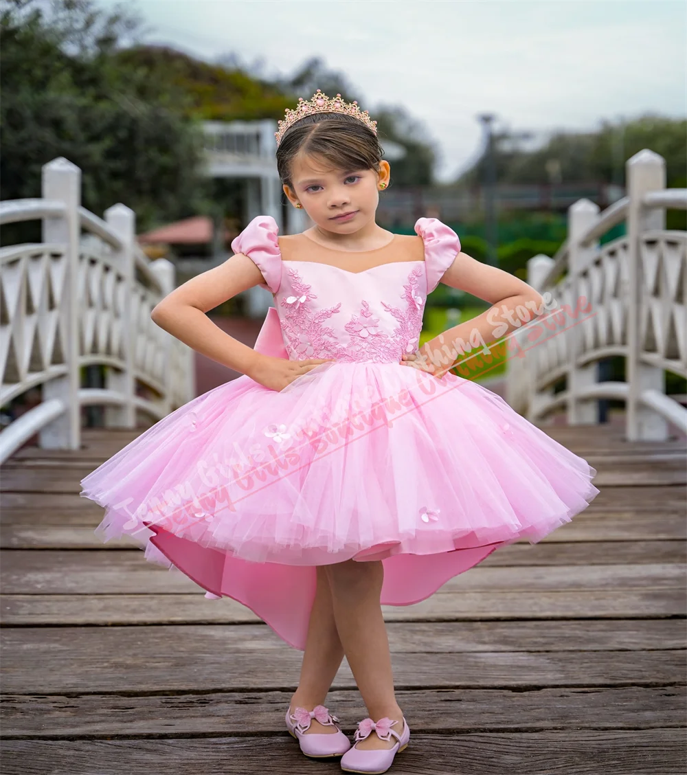 فستان فتاة الزهور الوردي الأنيق لحفلات الزفاف قبل قصير الظهر بفيونكة طويلة مفتوحة من الخلف للحفلات الراقصة الأميرة فستان التواصل الأول