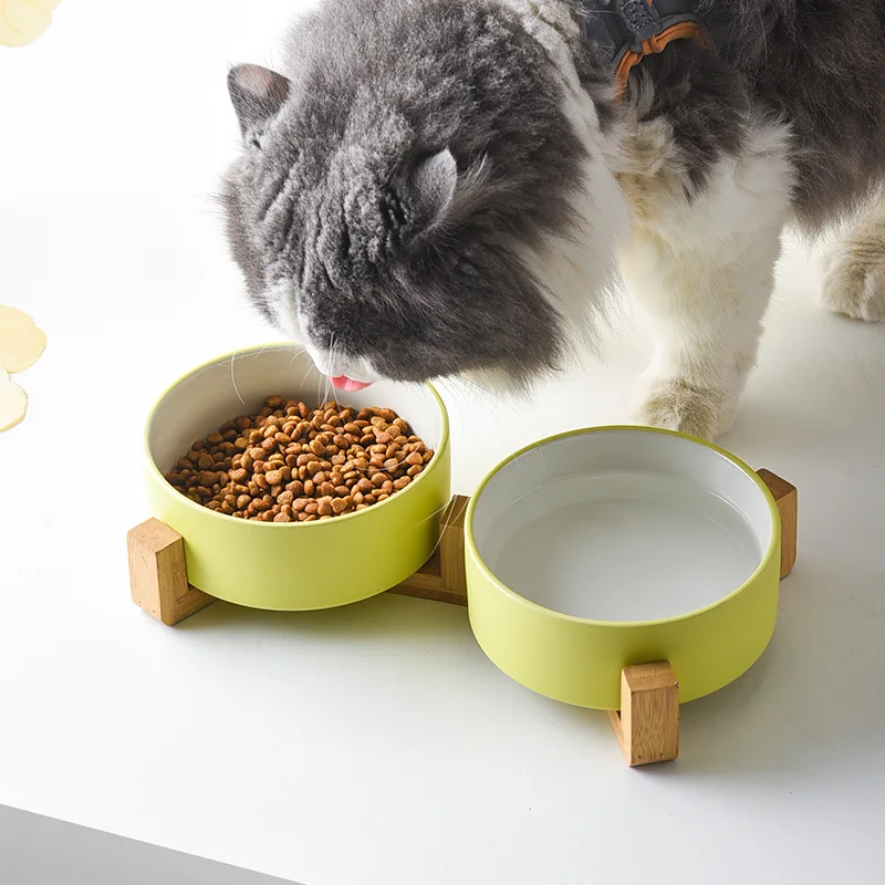 

Two-Tone Ceramic Dog and Cat Bowl with Stylish Solid Pattern Eco-Friendly Wooden Frame Multi-Pet Bowl and Feeder