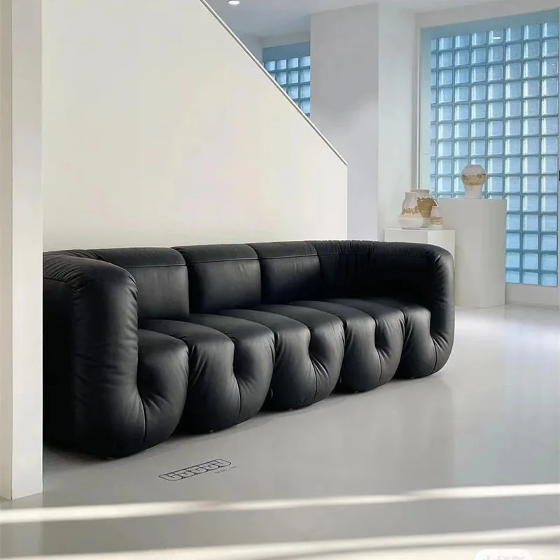 Italian designer bed and breakfast, retro black leather sofa