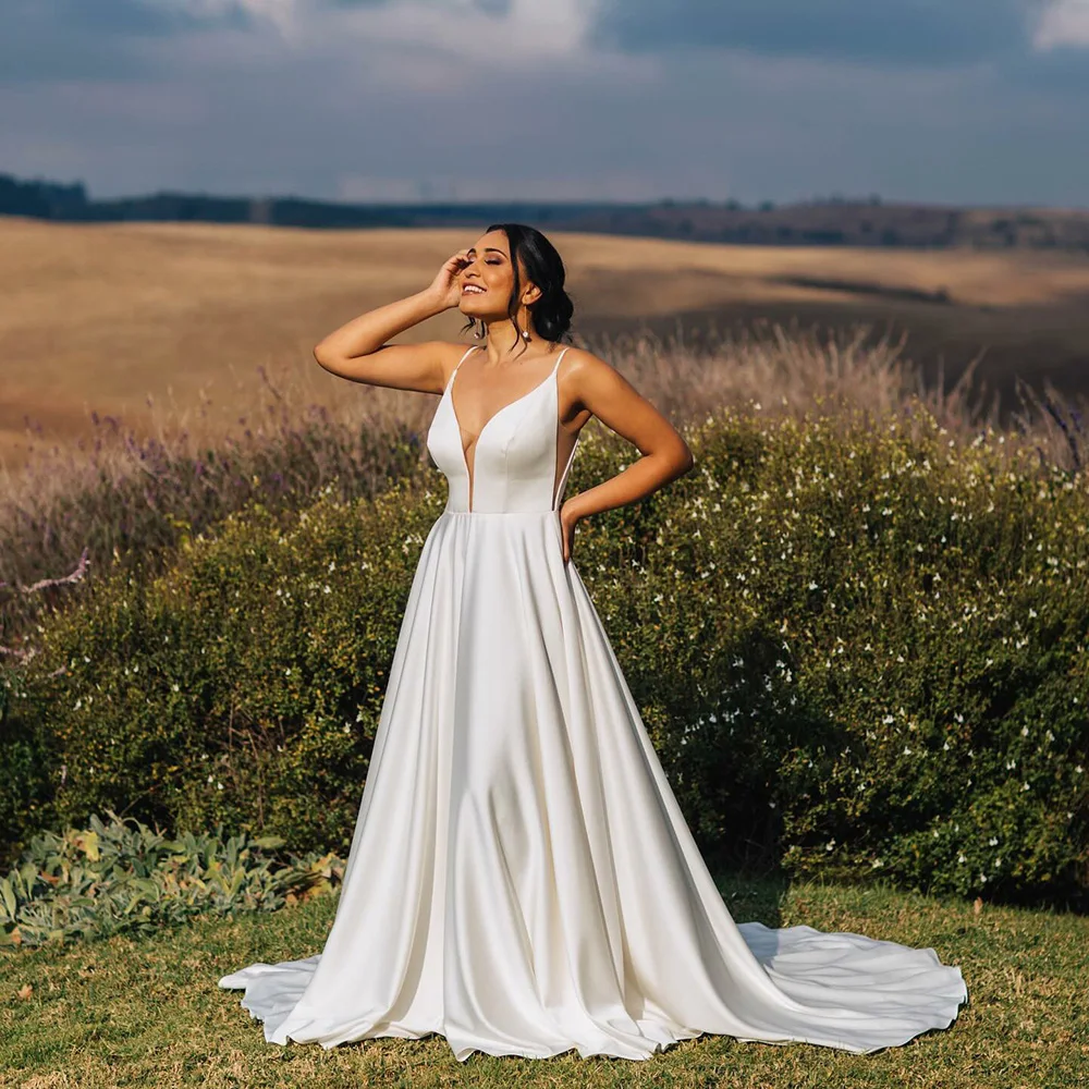 

2025 Satin Wedding Dresses Deep V Neck A Line Backless Sexy Spaghetti Strap Bridal Gown Outdoor Women Bride Dress Customized