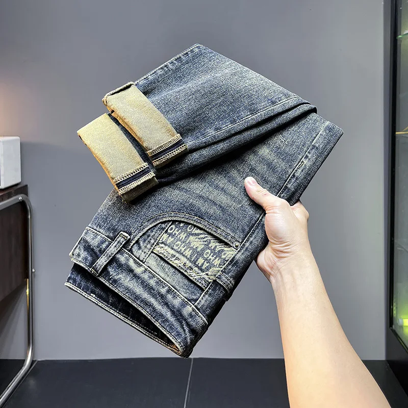 Jeans di fascia alta per uomo 2024 nuovo autunno abbigliamento da uomo Casual All-Match Fashion Vintage Print pantaloni elasticizzati di colore nostalgico