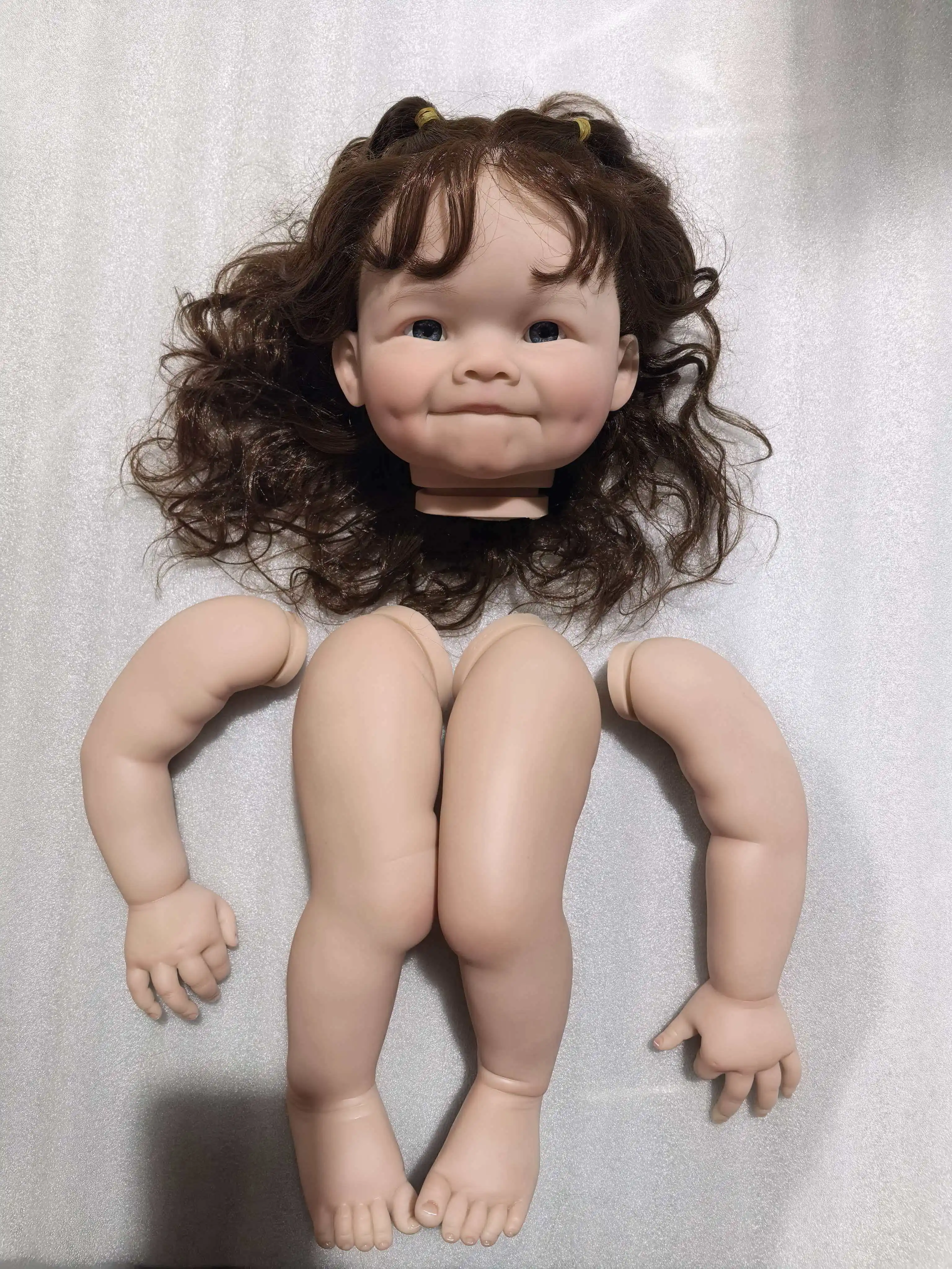 npk-24inch-raya-lifelike-unfinished-reborn-doll-kit-with-curly-brown-hair-painted-doll-parts-for-diy-collectible-figures