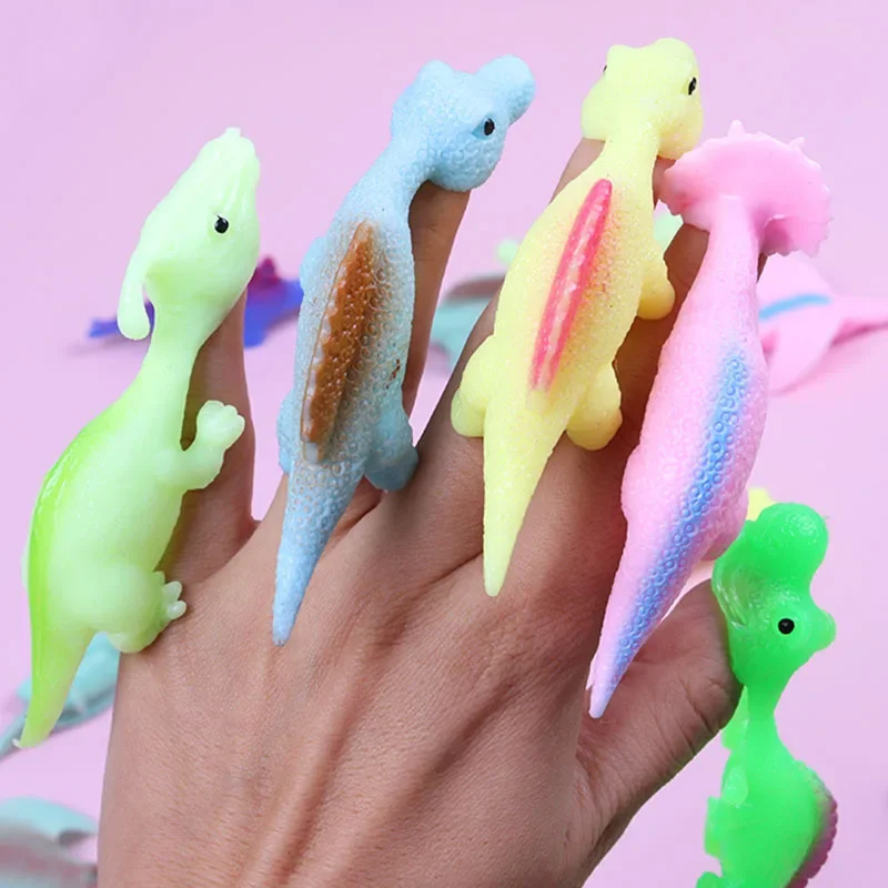 1PC Creative Dinosaur Finger Toys Kids Funny Cartoon Animals Anxiety Stress Relief Shooting Playing Toy Slingshot Catapult Game