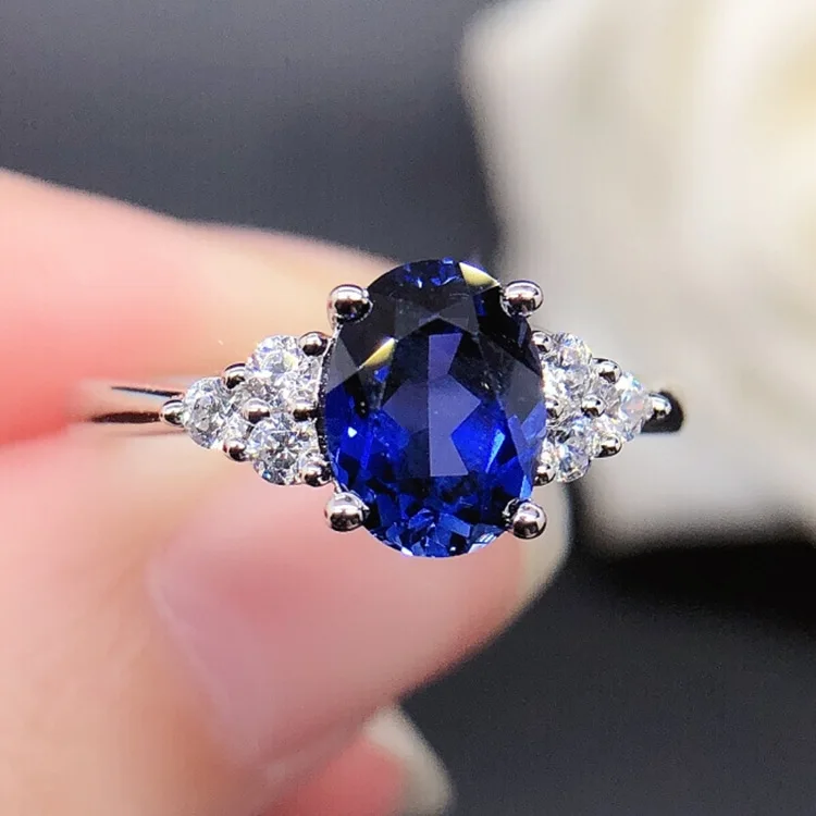 

Platinum PT950 blue sapphire oval-shaped ring for women. European and American fashionable unique-shaped diamond ring acce