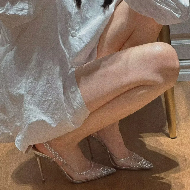 

2025 new thin heel pointed head shallow mouth drill bag head transparent high heels temperament celebrity single shoes women